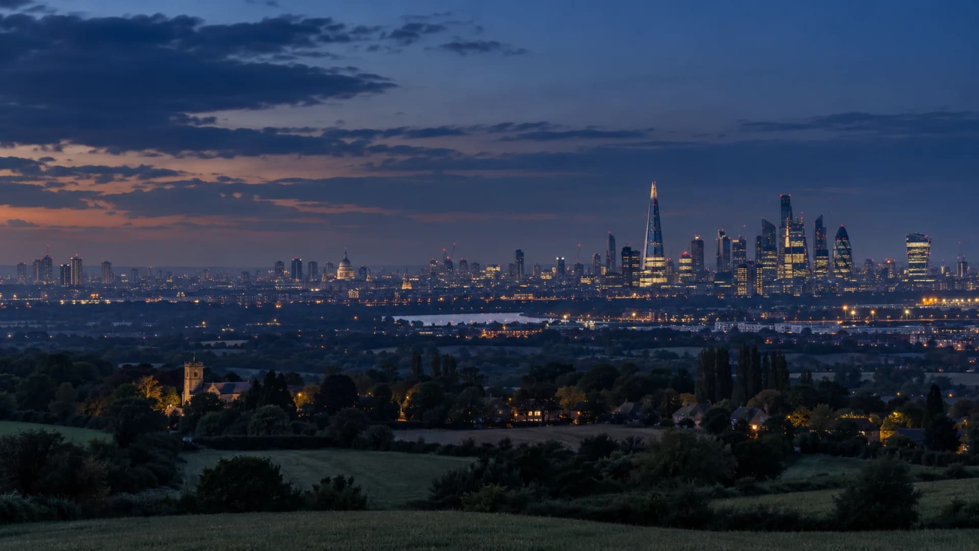 London skyline seen from the Essex countryside at blue hour