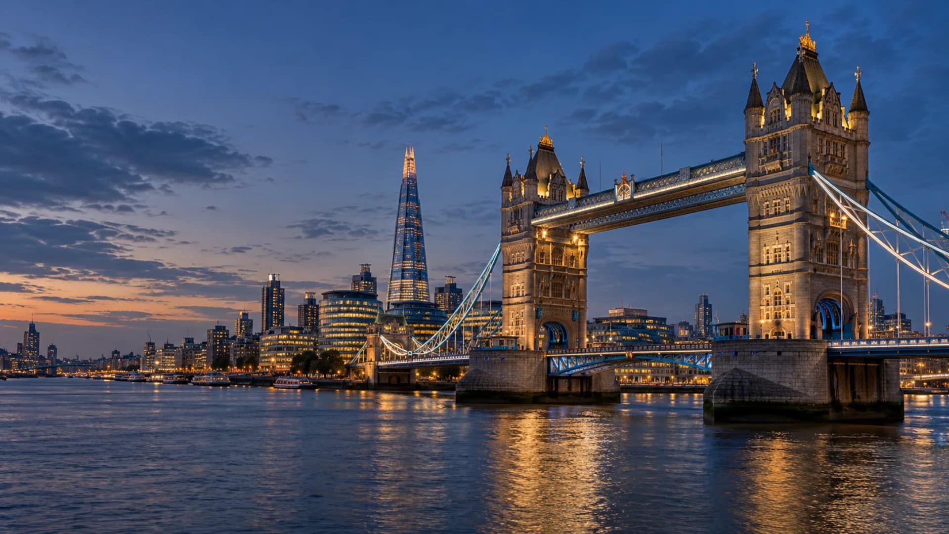 London skyline, Tower Bridge and the River Thames at blue hour